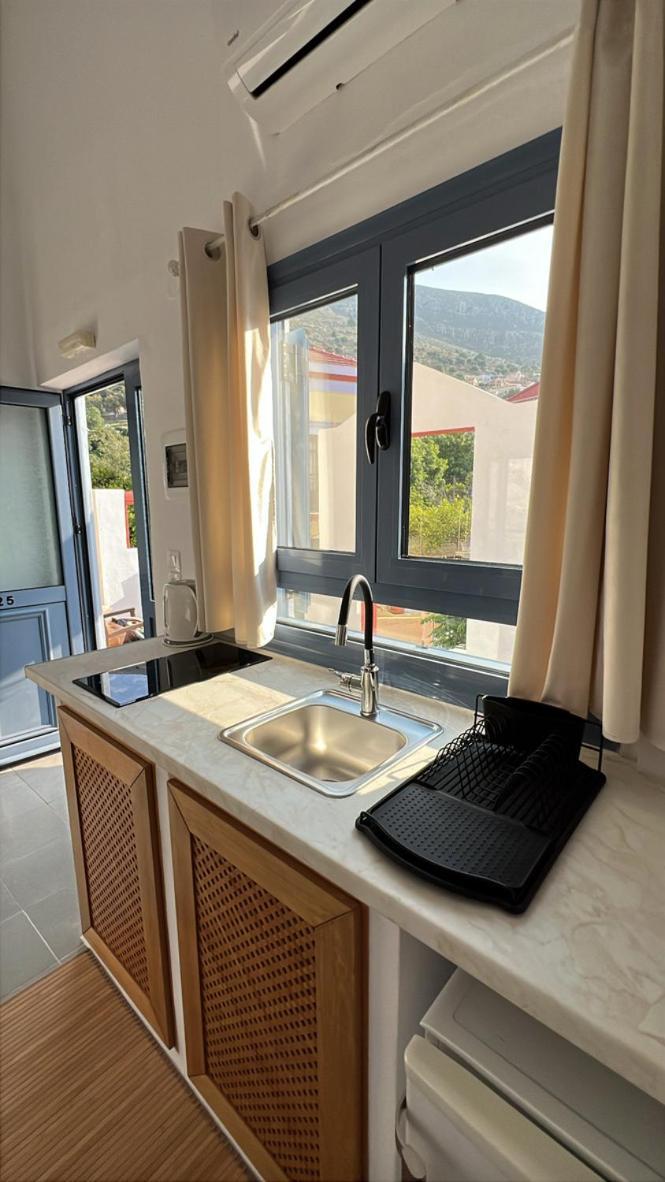 Aparthotel Taxiarchis Symi Exterior foto